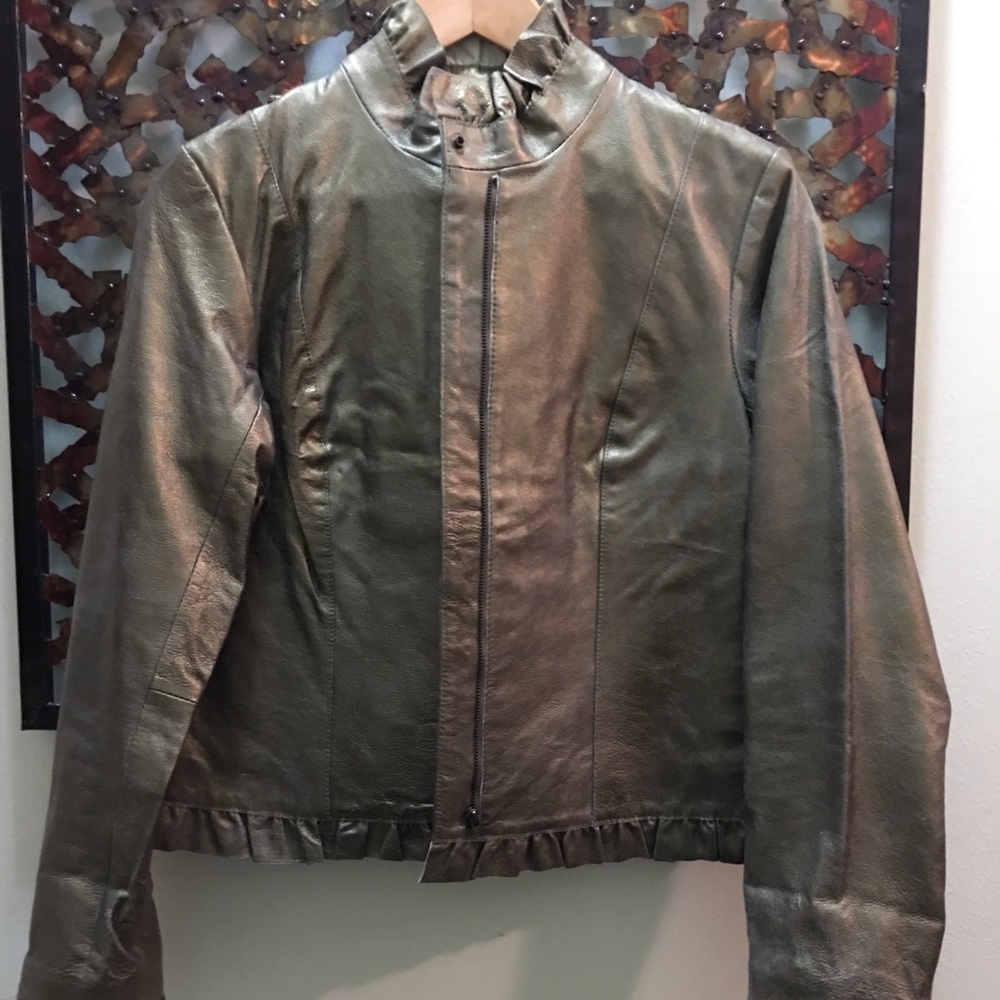 Light 100% leather jacket with silk lining.
